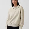 Dámská oversized polokošile s límečkem z těžkého materiálu