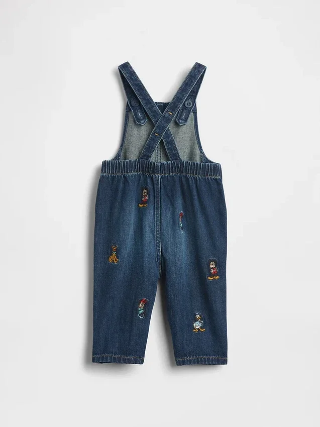 Džínové kombinézy GAP × Disney Baby