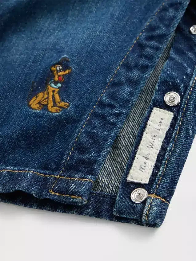 Džínové kombinézy GAP × Disney Baby
