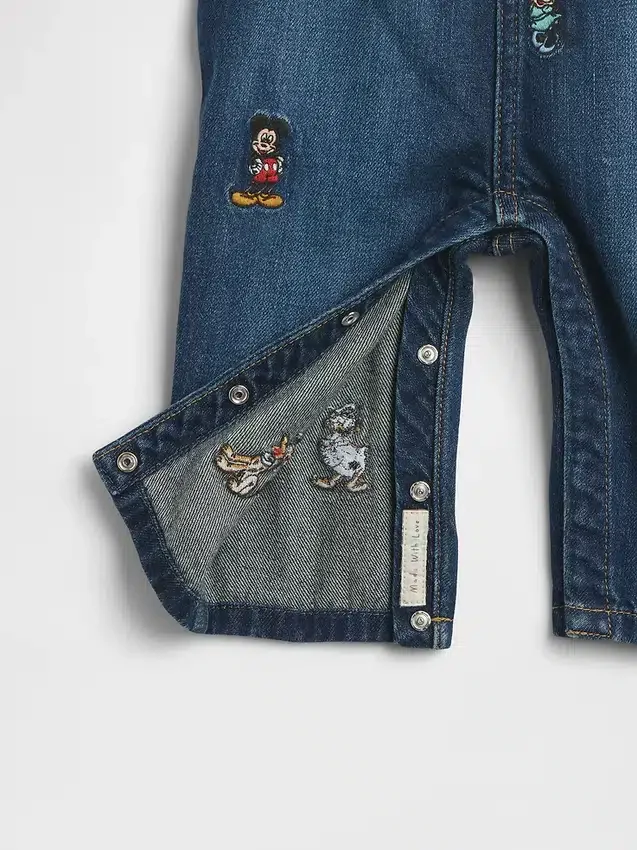 Džínové kombinézy GAP × Disney Baby