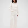 Džíny GAP × Victoria Beckham s vysokým pasem a obloukovým střihem