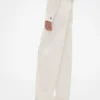 Džíny GAP × Victoria Beckham s vysokým pasem a obloukovým střihem
