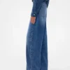 Džíny GAP × Victoria Beckham s vysokým pasem a obloukovým střihem