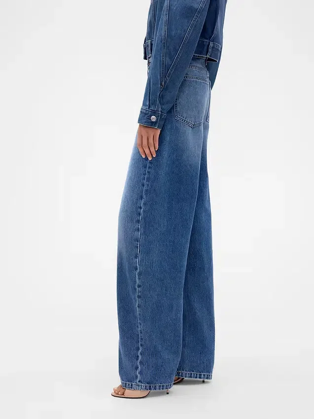 Džíny GAP × Victoria Beckham s vysokým pasem a obloukovým střihem
