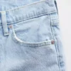 Džíny s středně vysokým pasem, volným střihem a rovnými nohavicemi