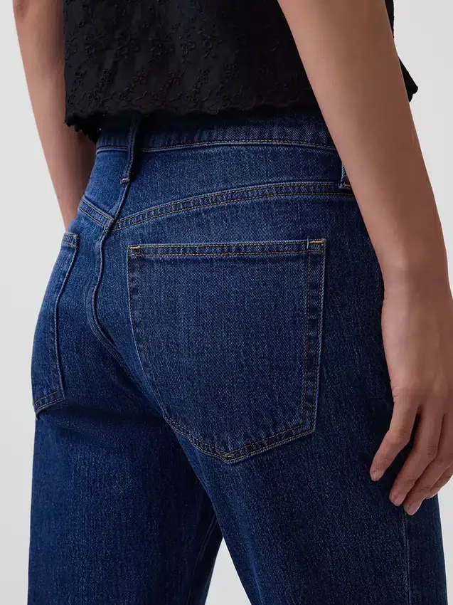Džíny s středním pasem a volným střihem typu bootcut