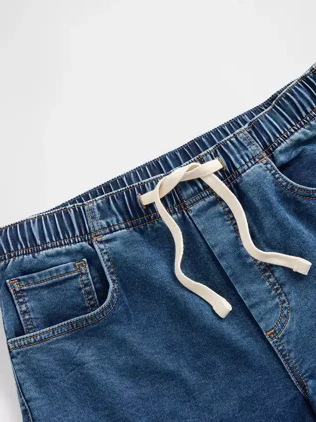 Džíny s volným střihem a středně vysokým pasem z pleteného denimu