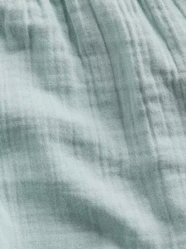 Dětské bavlněné šortky z gázy s motýlovým lemem