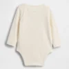 Dětský body z organické bavlny s kapesou a logem NYC z řady Baby First Favorites