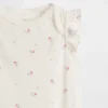Dětské body z organické bavlny s volánkovými rukávy z řady Baby First Favorites