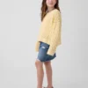Dětský háčkovaný svetr s kulatým výstřihem v oversized střihu
