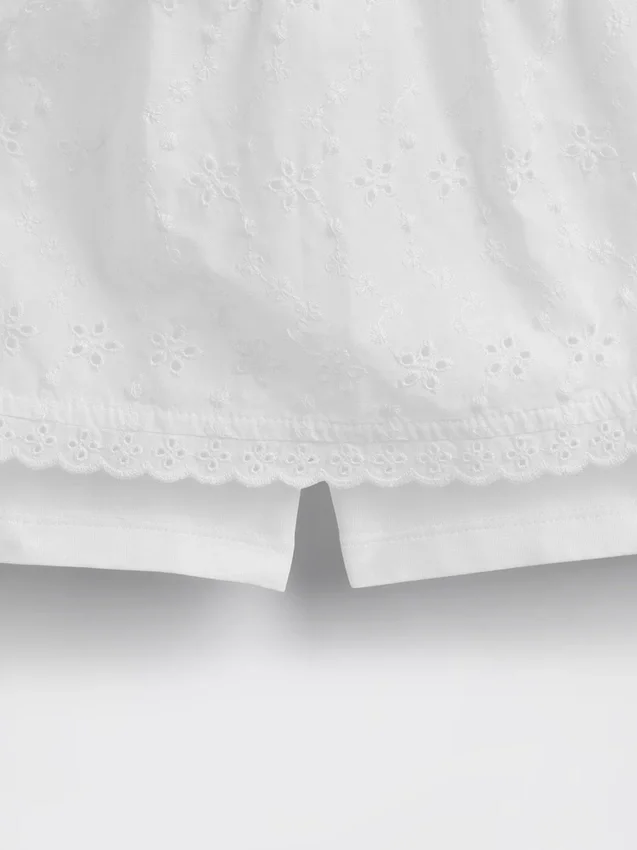 Dětská skort s očky a přeloženým pasem