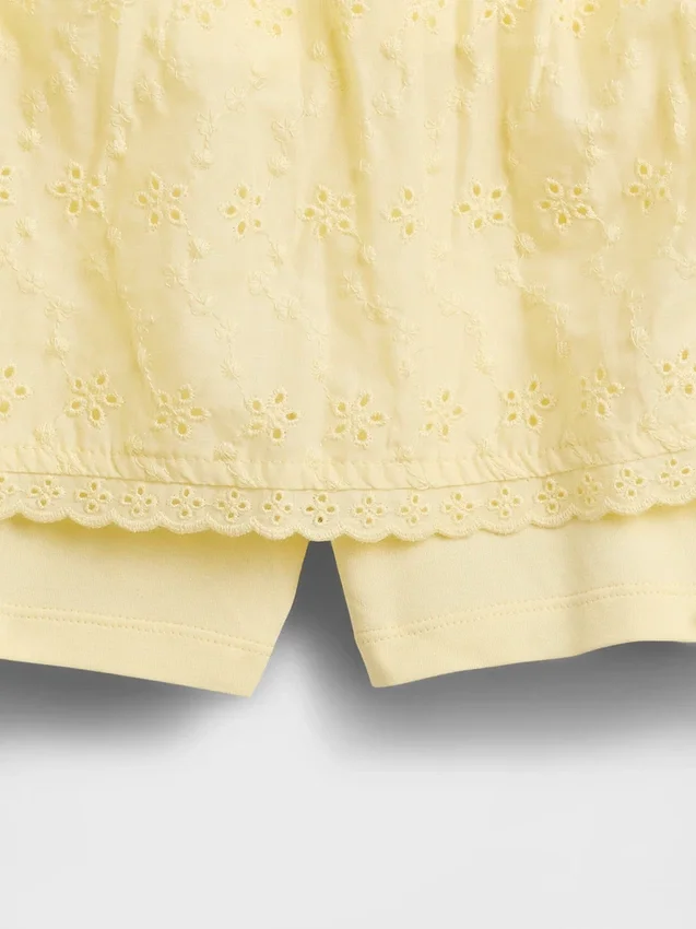 Dětská skort s očky a přeloženým pasem