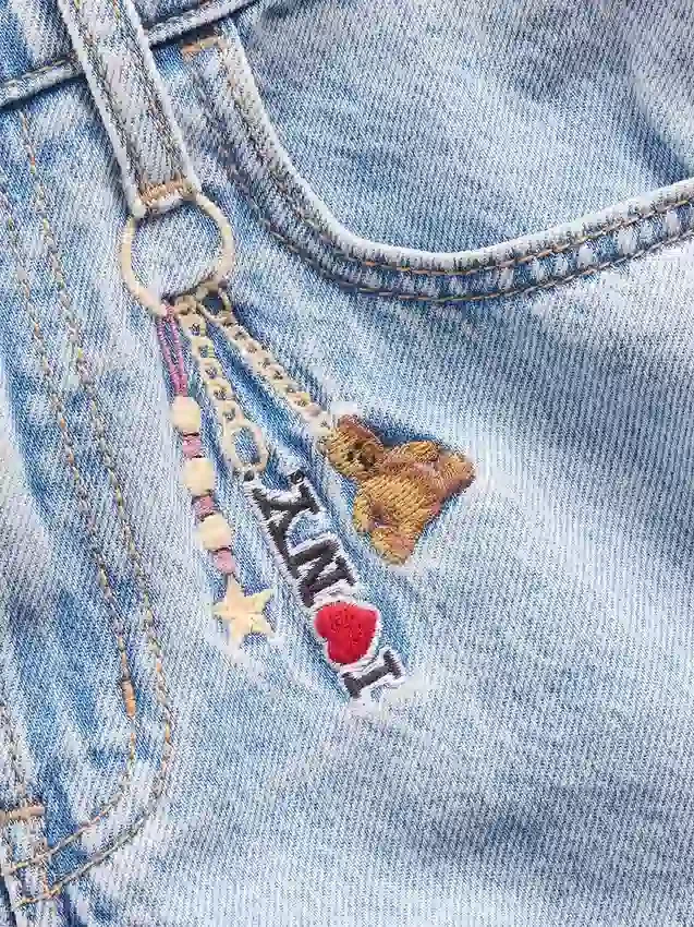 Dětské volné džíny s nízkým pasem a výšivkou „I Heart NY“