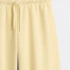 Dětské volné joggerové kalhoty Vintagesoft s krajkovým lemem