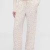 GAP × Summer Fridays Volné flanelové pyžamové kalhoty s tečkami