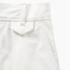 GAP × Victoria Beckham – kalhoty s vysokým pasem a plisovaným obloukem