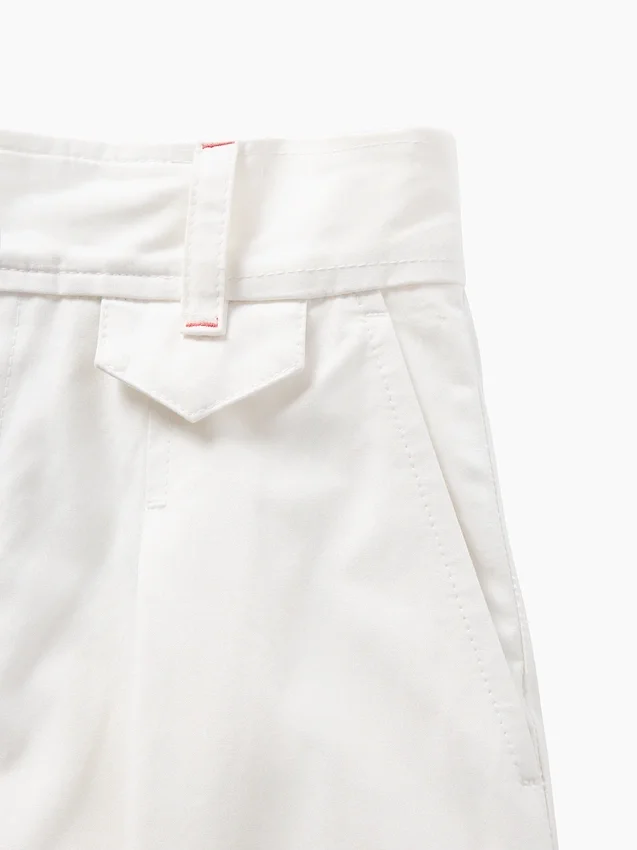 GAP × Victoria Beckham – kalhoty s vysokým pasem a plisovaným obloukem
