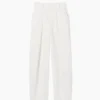 GAP × Victoria Beckham – kalhoty s vysokým pasem a plisovaným obloukem