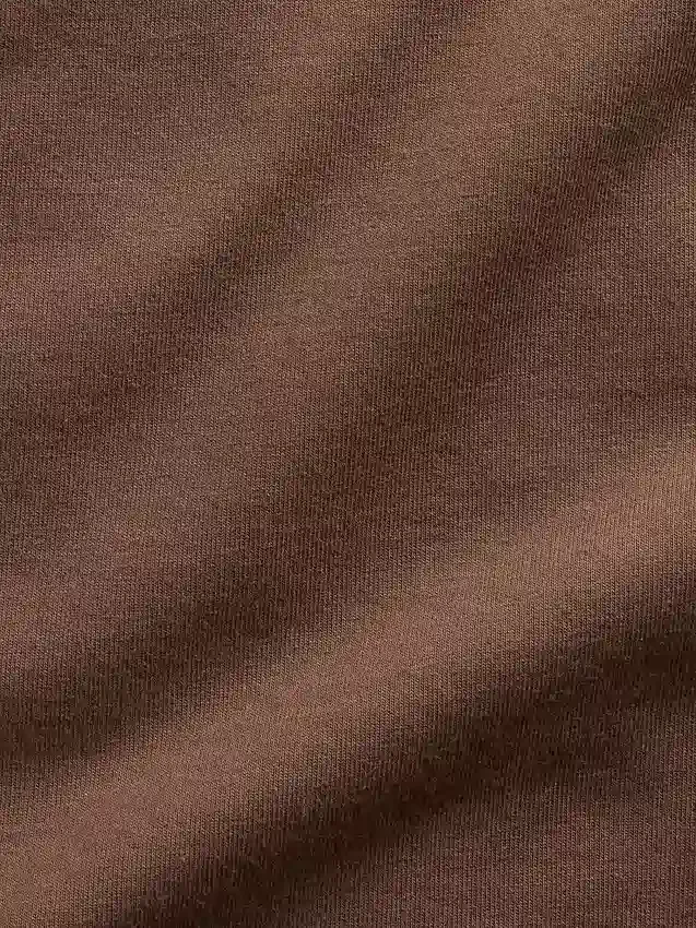 Krátké tílko z hustě pleteného džerzeje s lodním výstřihem