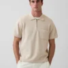 Oversized svetr s kapesním polo tričkem a čtvrtinovým zipem
