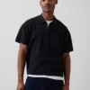 Oversized svetr s kapesním polo tričkem a čtvrtinovým zipem