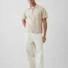 Oversized svetr s kapesním polo tričkem a čtvrtinovým zipem