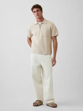 Oversized svetr s kapesním polo tričkem a čtvrtinovým zipem