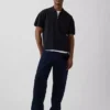 Oversized svetr s kapesním polo tričkem a čtvrtinovým zipem