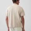 Oversized svetr s kapesním polo tričkem a čtvrtinovým zipem