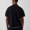 Oversized svetr s kapesním polo tričkem a čtvrtinovým zipem