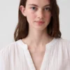 Oversized top z bavlněné gázy s rozparkem u krku
