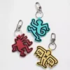 Přívěsek na tašku Keith Haring