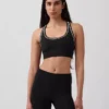 Sportovní podprsenka GapFit Smooth s racerbackem pro střední zátěž