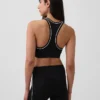 Sportovní podprsenka GapFit Smooth s racerbackem pro střední zátěž