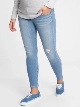 Těhotenské skinny džíny s nízkým pasem, celoplošným panelem a efektem opotřebení