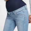Těhotenské skinny džíny s nízkým pasem, celoplošným panelem a efektem opotřebení