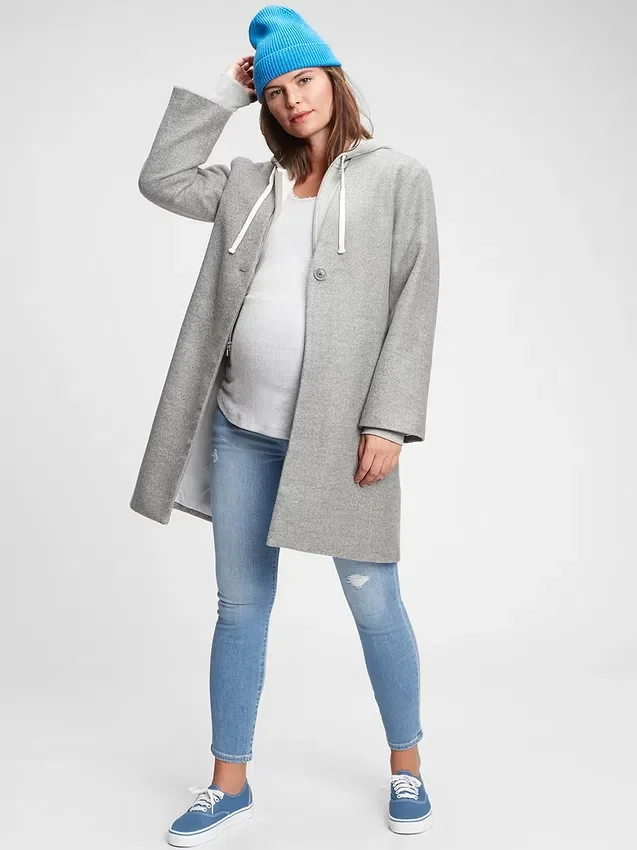 Těhotenské skinny džíny s nízkým pasem, celoplošným panelem a efektem opotřebení
