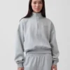 Vintagesoft Oversized pulovr s polozipem a klínovým výstřihem